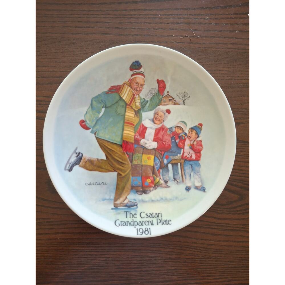 Edwin M Knowles China Co. Collectible plate titled "The Skating Lesson".